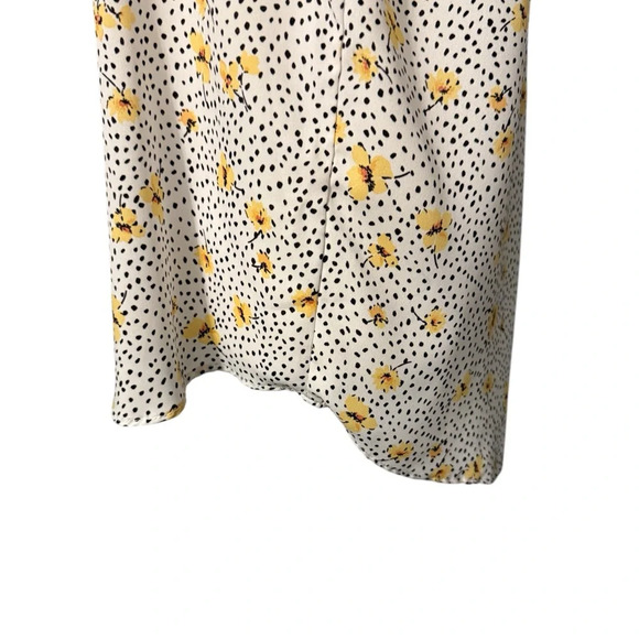 Lily White v neck top with black design with yellow flowers. Hi-Lo Size Medium - Picture 4 of 8